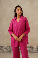 Front view of fuchsia collared shirt with V-neckline