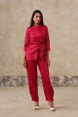 Woman wearing rani pink satin shirt pant set, front view
