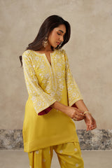 Woman wearing yellow Aari embroidered farshi salwar set for haldi with ombre dupatta SLEEVES