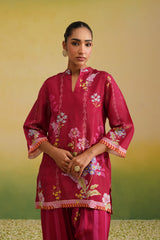 close up Woman wearing pink floral printed tissue co-ord set with striped salwar