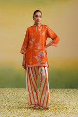 Woman wearing orange floral printed tissue kurta with striped farshi salwar, shimmer tissue