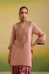close up of Woman wearing pink silk farshi salwar set with hand embroidered kurta and dupatta, zardozi work, zari work