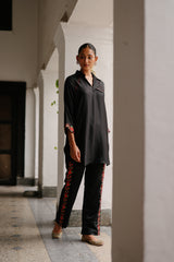 Black Top with Floral Embroidered Pants