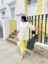 White Cutwork Elegance Top with Striped Narrow Salwar