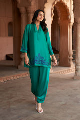 Jashn Emerald Cutwork Embroidered Co-ord Set, emerald modal tunic with dark blue cutwork embroidery and harem pants, image 1 of 5