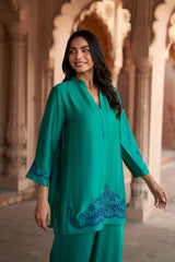 Jashn Emerald Cutwork Embroidered Co-ord Set, emerald modal tunic with dark blue cutwork embroidery and harem pants, image 2 of 5